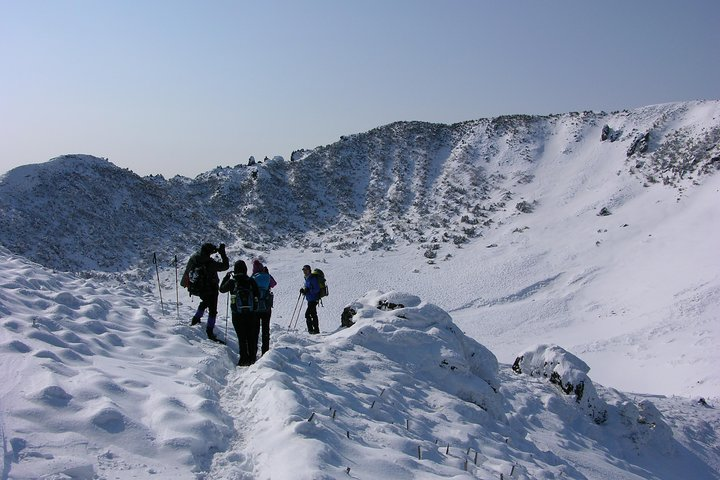 Experience the stunning snow-covered trails of Hallasan perfect for adventurous hiking. Discover breathtaking views and explore the natural beauty of Jeju Island combined with exceptional local expertise.